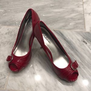 Great condition shiney red faux leather stilettos